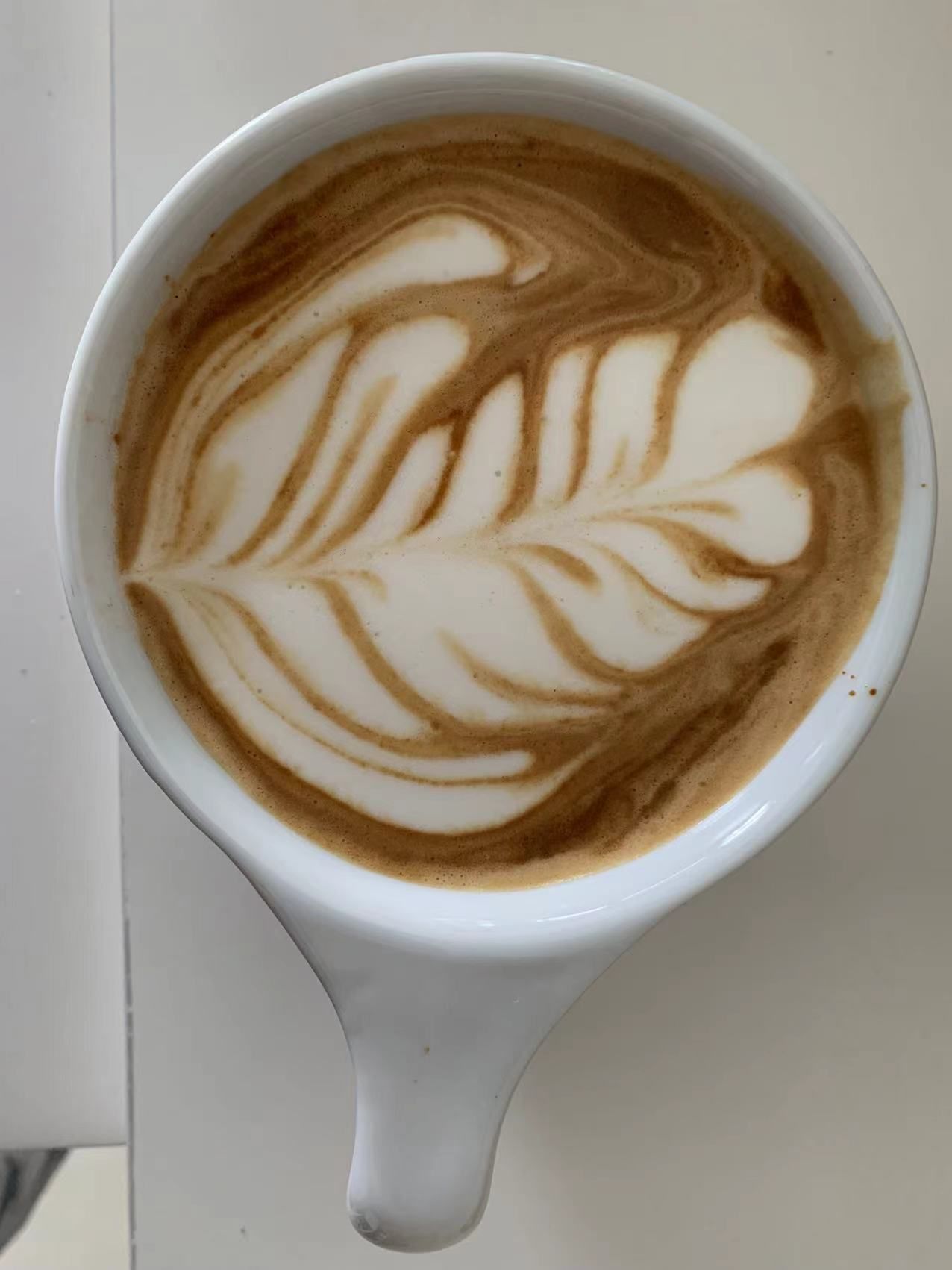 FINALLY! Been trying latte art for a year, sporadically. Almost always  failed. Today, first try with the thermometer, I pretty much nailed it  (comparing before using this). I thought it was too